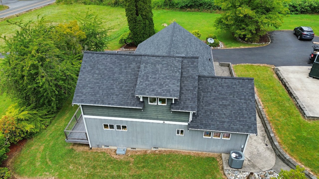 After: Full tear-off, deck repair and re-roof, three days apart