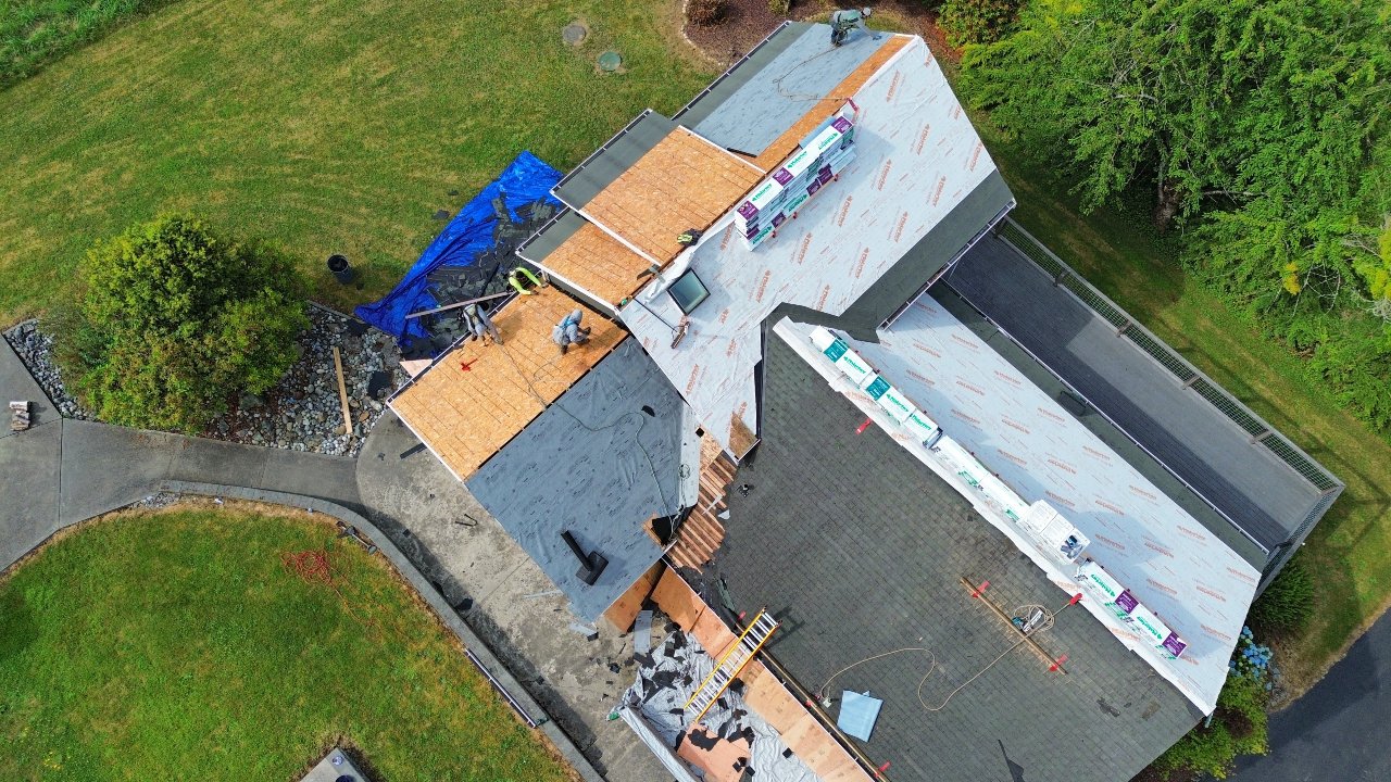 Before: Full tear-off, deck repair and re-roof, three days apart